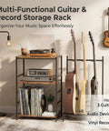 Guitar Stand For Multiple Guitars With 3 Tier Display Rack holds acoustic, electric guitars in home studio setting with vinyl records.