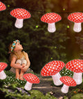 Forest Theme Mushroom Shaped Paper Lanterns Set, 6 Pack Hanging Lanterns with girl in fairy garden setting