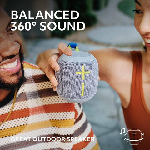 Friends enjoying Wonderboom 4 Portable Bluetooth Speaker With Waterproof Floating Design, Balanced 360-Degree Sound