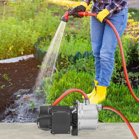 Person using Beefy Three Quarter HP SUS304 Stainless Shallow Well Jet Pump 115V 18.5 GPM 131 Ft Head for garden irrigation