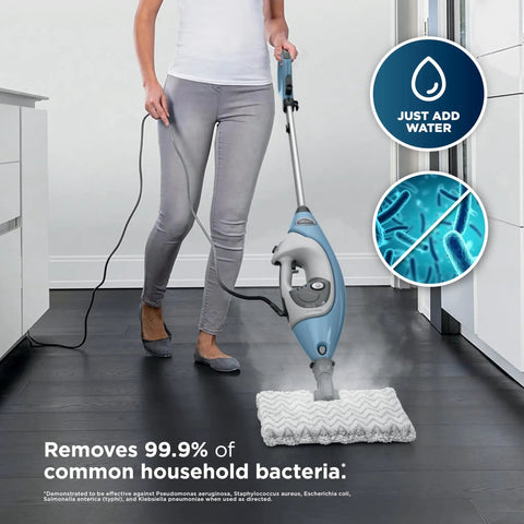 Whole Home Steam Mop With Detachable Handheld cleaning sealed floors, showcasing steam action and removable pad.