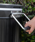 Close-up of 120-Qt Rolling Ice Chest Cooler Cart With Wheels And Drink Dividers, Portable handle being held, Black color.