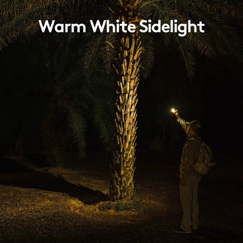 Person using A28 Gen 2 Pocket Flashlight 1000 Lumens Beast Mode Turbo Beam With Sidelight USB C Rechargeable at night on a tree