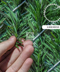 Close-up of Heavy Duty Privacy Hedge Slats for Chain Link Fence, showing dense PVC pine needle bristles for outdoor privacy.