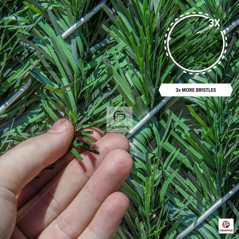 Close-up of Heavy Duty Privacy Hedge Slats for Chain Link Fence, showing dense PVC pine needle bristles for outdoor privacy.