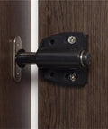 Magnetic Door Latch Kit For Cabinets And Furniture, Easy Open Touch Latch with black mount on dark wood surface