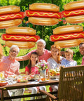 Family picnic with Giant Hot Dog Foil Balloons Set Of 6 That Inflate To 28 Inches Perfect For Picnic BBQs And Birthday Parties