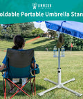 Foldable Portable Beach Umbrella Stand With Weight Bag Sturdy Rust Free Tempered Iron Go To Base Holder on grass lawn