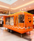 Kickstart Your Street Food Hustle With This Commercial Grade Mobile Food Truck Trailer Equipped With Full Stainless Steel Prep Areas And Durable Construction For Hot Dog Coffee Ice Cream Vending, featuring a vibrant orange exterior design.