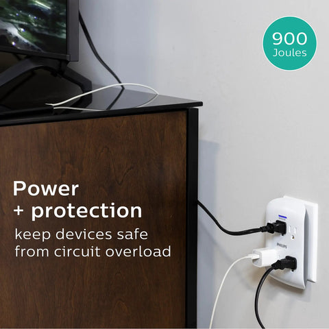 Six-Outlet Surge Protector Wall Tap, 2 Pack, 900 Joules in use on wall with devices plugged in, ideal for home office.