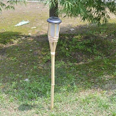 Sun Powered Bamboo Torch Lights Set, 10 Piece Solar Tiki Garden Lamps for Outdoor Yard, single lamp installed on grass