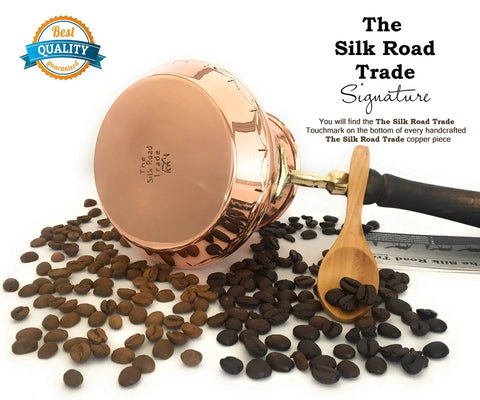 Dope Thick Solid Copper Turkish Greek Arabic Coffee Pot With Wooden Handle surrounded by coffee beans and a wooden scoop