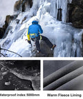 Climber wearing Mens Snow Ski Hiking Pants Waterproof Winter Fleece Lined Softshell Snowboard Pants With Zippered Bottom Legs And Built In Belt Ideal For Hiking Snowboarding Skiing In Cold Weather Wind Resistant Navy Medium on icy terrain