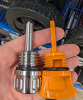 Hand holding a Magnetic Oil Dipstick For Predator 8750 9000 9500 13000 Generators, 27mm Threads, Stainless Steel next to plastic dipstick.