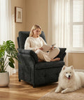 Woman reading on Power Recliner Chair With Heat And Massage, Linen Electric Recliner Sofa in dark grey with dog by her side.