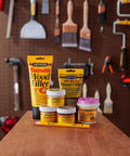 Minwax Golden Oak Wood Putty Filler For Quick Scratch And Nail Hole Repair Non Hardening Stain Matched Diy Wood Touch Up 3.75 Oz Tub products displayed on a workbench.