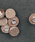 Heavy Duty Nail On Furniture Glides Brown 100 Pack Smooth Chair Pads For Hardwood Tile And Laminate Floors showing multiple glides with metal caps.
