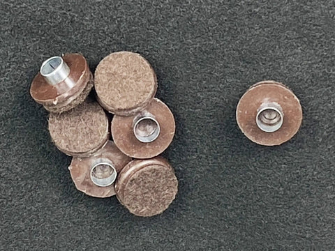 Heavy Duty Nail On Furniture Glides Brown 100 Pack Smooth Chair Pads For Hardwood Tile And Laminate Floors showing multiple glides with metal caps.