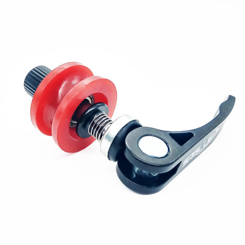 Red and black bike chain keeper holder for cleaning and lubing with quick-release mechanism for dropout installation.