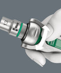Close-up of hand using Kraftform Kompakt Zyklop Pouch Set with 13mm socket for quick flexible fastening