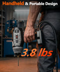 Man holding Portable 110V Welder For Home Shop And Auto Repair 20 To 120 Amp IGBT Inverter Handheld Stick Welder in workshop