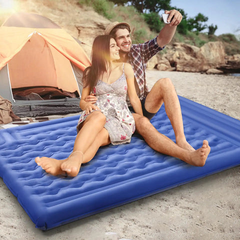 Couple sitting on Double Camping Sleeping Pad Comfy 6 Inch Thick Self Inflating 2 Person Mat With Built In Pillow on beach