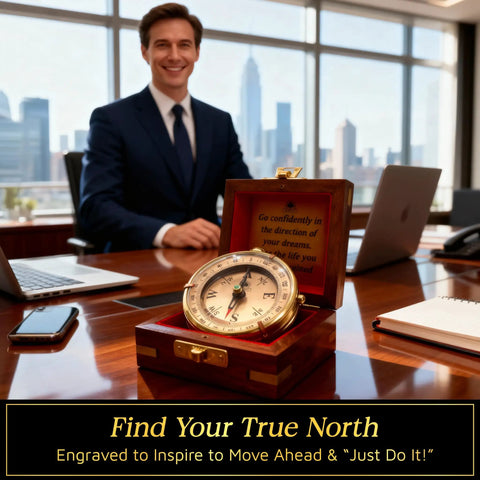 Go Confidently Brass Compass Gift For Graduation displayed on office desk with man in suit