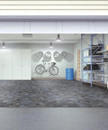 Heavy Duty Vinyl Cove Wall Base Molding Trim In Aircraft Carrier Finish With Hella Flexible Strength For No Sweat Diy Floor Edging Installation And Sweet Room Refresh Projects in a modern garage setting with a bike and storage.