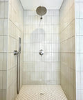Modern shower stall with All Brass Wall Supply Elbow With Flange No Fuss One Piece Design Half Inch NPT Female Inlet G Half Inch Outlet.