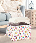 Badass Foldable Storage Bin With Heavy Duty Frame And Padded Handles For Home Organization 300D Oxford Fabric Clothes Cube holding blankets on a living room floor.