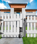 Spring Loaded Gate Wheel With 360 Degree Universal Mount for wooden gate, installed on white fence, black wheel visible