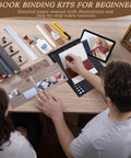 People using All In One 145Pcs Book Binding Kit with A5 Paper And Tools, including needles, thread, awl, ruler on table.