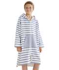 Child wearing Ultra Soft Turkish Cotton Kids Bathrobe And Hooded Towel Poncho With Zip Up, terry lining, and pockets, striped design