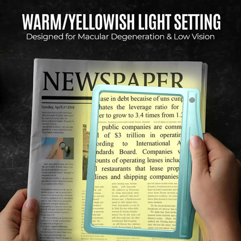 5X Rechargeable LED Page Magnifier With Large 4.5 By 7 Inch Viewing Area showing warm light setting on newspaper