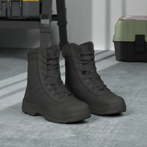 Mens Heavy Duty Steel Toe Work Boots For Construction And Industrial Safety With Puncture Resistant Midsole in a workshop setting.