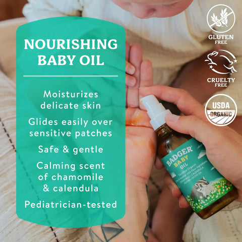 Organic Baby Oil With 5 Simple Ingredients To Soften Dry Skin And Cradle Cap, 4 Fl Oz glass bottle in hand next to baby foot.