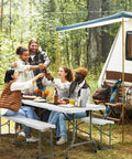 Group enjoying picnic on 6 Ft Folding Picnic Bench With HDPE Tabletop, Totally Portable Indoor Outdoor Seating, near camper