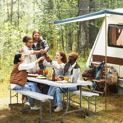 Group enjoying picnic on 6 Ft Folding Picnic Bench With HDPE Tabletop, Totally Portable Indoor Outdoor Seating, near camper