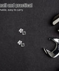 Pair M Two Point Five By Zero Point Four Five By Seven Pro Grade Miniature Screws for Turntable Repair Kit next to wrenches on dark surface