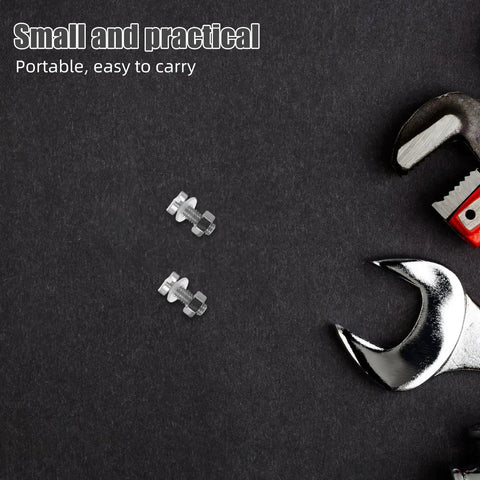 Pair M Two Point Five By Zero Point Four Five By Seven Pro Grade Miniature Screws for Turntable Repair Kit next to wrenches on dark surface