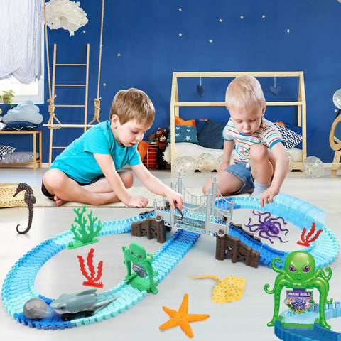 Children playing with Shark Race Track Set With Bendable Cars For Kids Aged 3 To 9, 183 Piece Ocean Themed STEM Playset in room