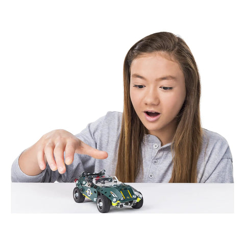 Child playing with Roadster 5-In-1 Building Kit With 174 Parts, Pull-Back Racer, Real Metal Components For STEM Engineering Education