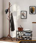 Freestanding Bamboo Coat Rack With 8 Hooks, Adjustable Height Entryway Stand in classic brown, holding hats and jackets