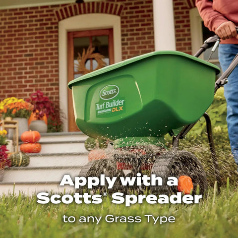 Fall Lawn Fertilizer Sets Up Solid Roots For Serious Recovery From Summer Slump And Heat Stress with Scott's Spreader applied in yard.