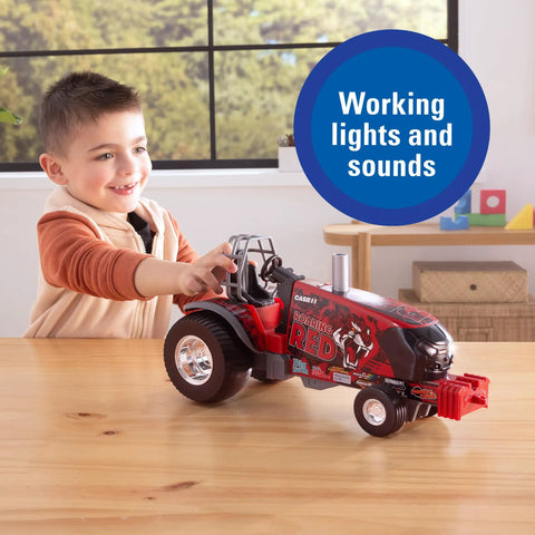 Case IH Barn Buster One Sixteenth Scale Pulling Tractor with child showing thunder engine sounds, free rolling wheels, chrome rims