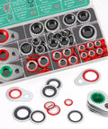Top-down view of a 95-piece automotive AC compressor gasket kit in a clear case with red and black O-rings.