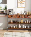 Heavy Duty 47 Inch Console Table With Upgraded Fabric Drawers And Spacious Three Tier Open Shelving Goes Smooth Behind Your Couch For Quick Living Room Update Rustic Brown Design placed near kitchen with coffee maker