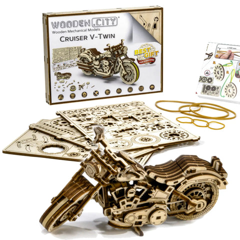 Cruiser V-Twin 3D Puzzle Kit for Adults with wooden motorcycle parts, model box, and assembly sheets on display.