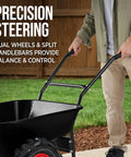 Person using Heavy Duty Dual Wheel Workhorse Wheelbarrow Garden Cart With 500 Lb Capacity Extra Large Wheels Built In Stand Jet Black