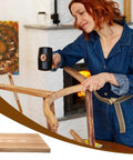 Woman sanding furniture with pocket hole plugs, product type 300 Pack Solid Wood Pocket Hole Plugs For Pocket Hole Jig visible on table.